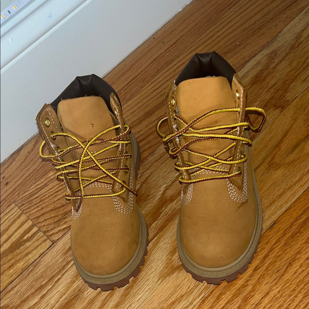 Tan Timberlands. Worn a few times, very good condition, 10C (toddler)